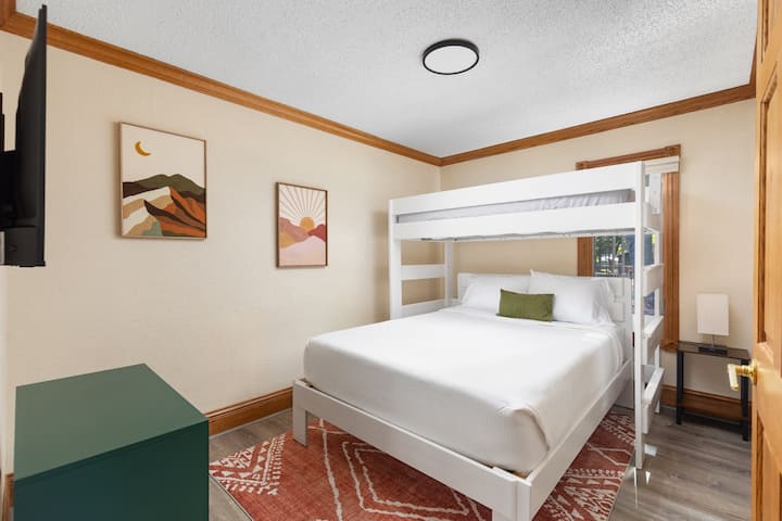 The third bedroom offers a twin loft bed over queen bed. 
