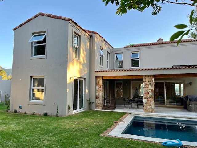 Peaceful family home with pool alongside stream