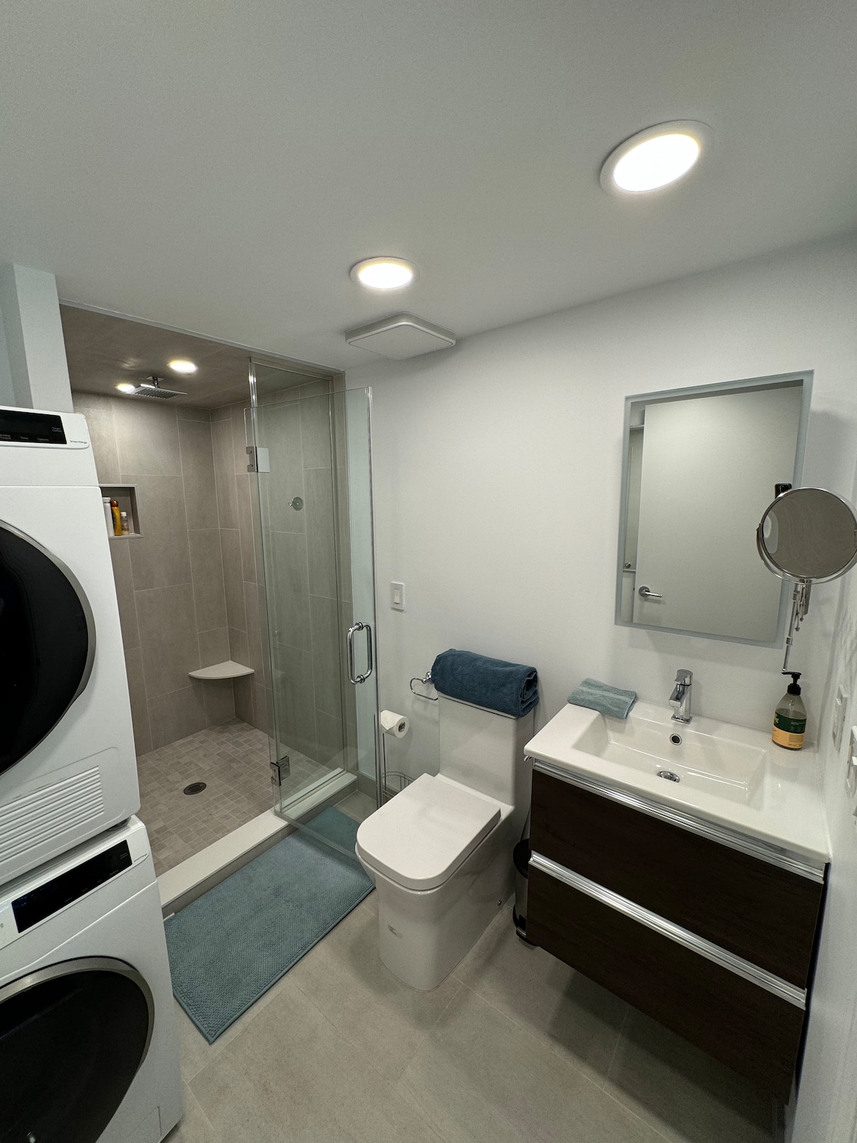 Kitchenette with sink, storage, and cookware