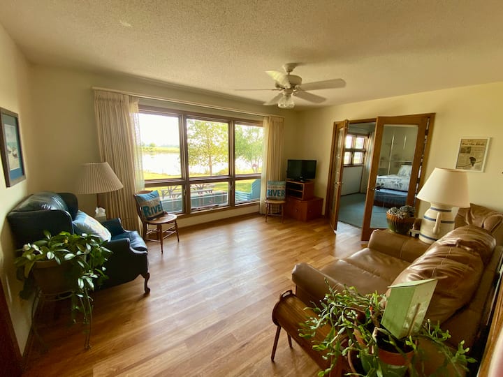 The sunroom is just outside the main bedroom with amazing views of the river. 