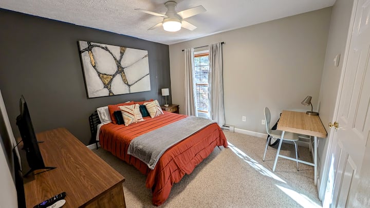 Bedroom 4: Queen bed with smart TV