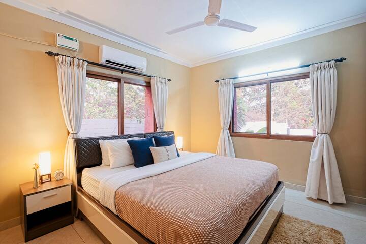 This Room is Located in the Ground floor and the only room in this floor, it comes with a large Wardrobe And a King Size Bed with Firm and Soft Pillows for the comfortable sleep the windows are overlooking the pool and entrance area of the house