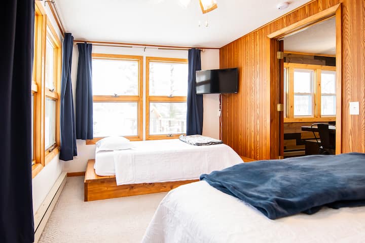 1st floor bedroom.  (King and Twin).  Smart TV.  USB ports.  Expansive lake views. 