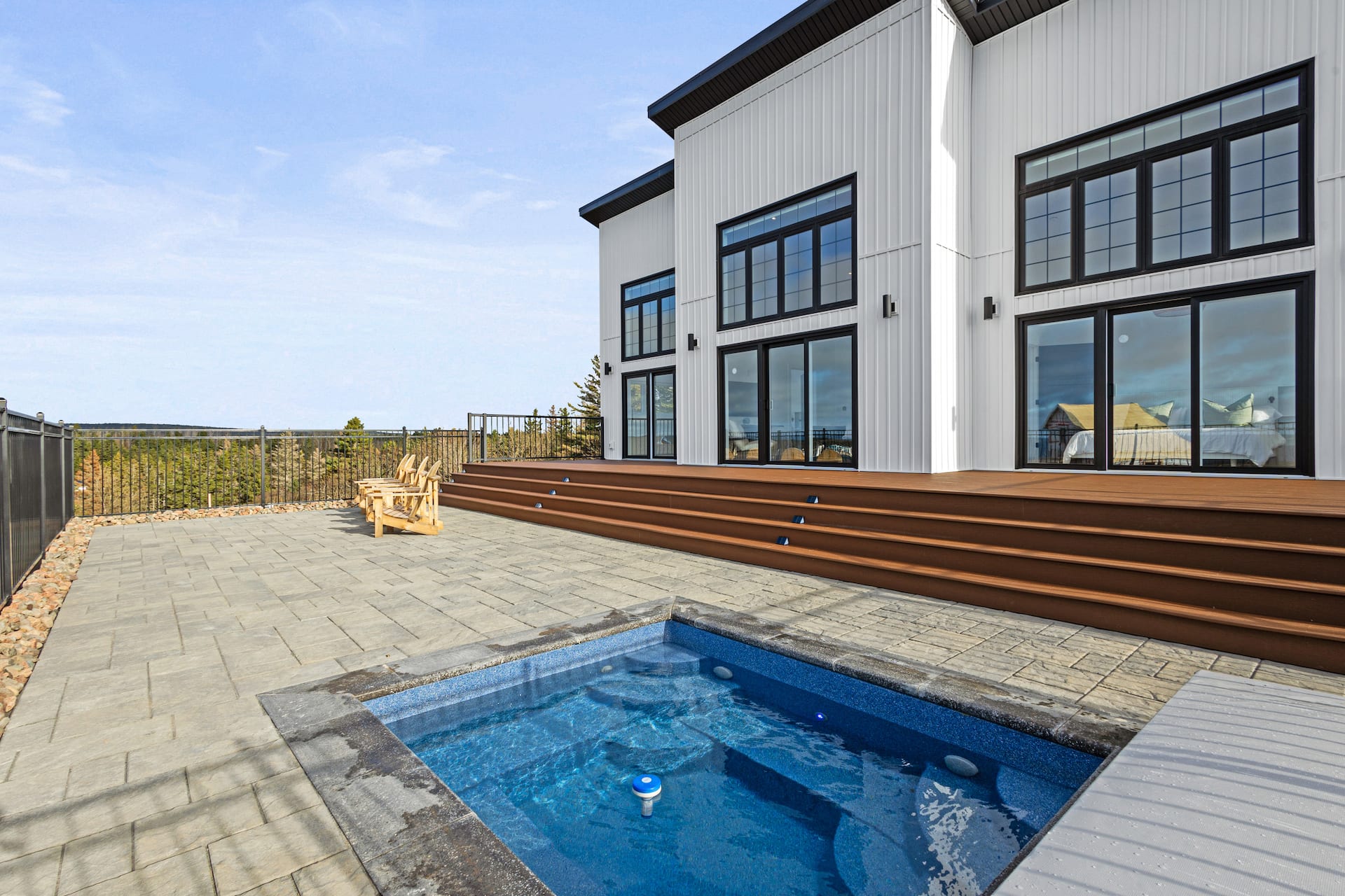 In ground HOT TUB + 2 primary bedrooms w/ ensuites