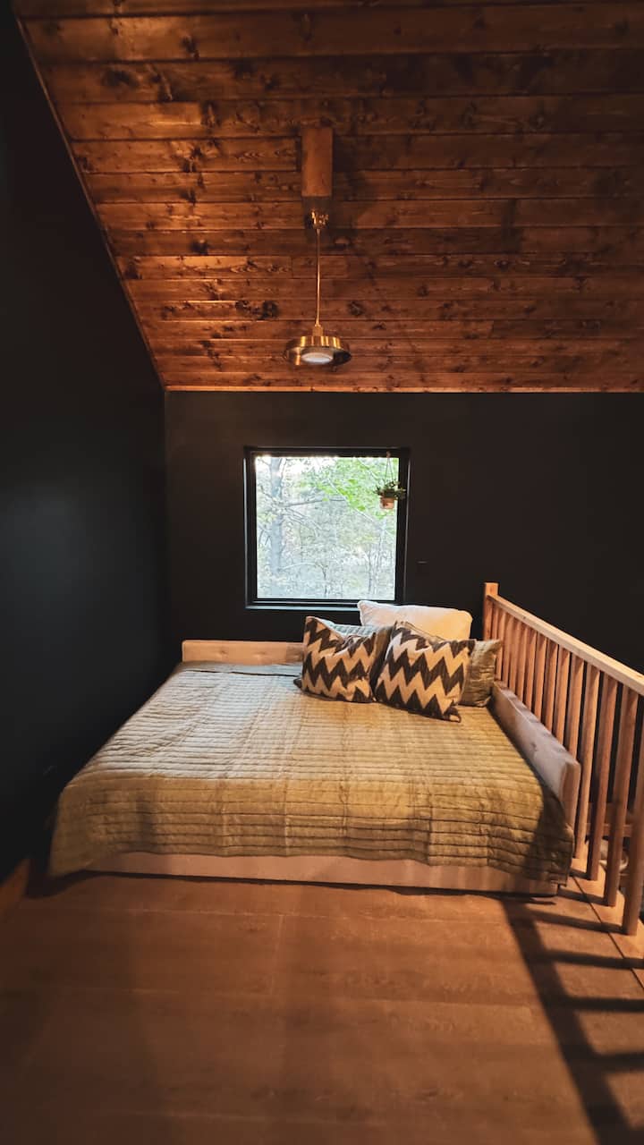Open loft area with a Queen bed + twin trundle