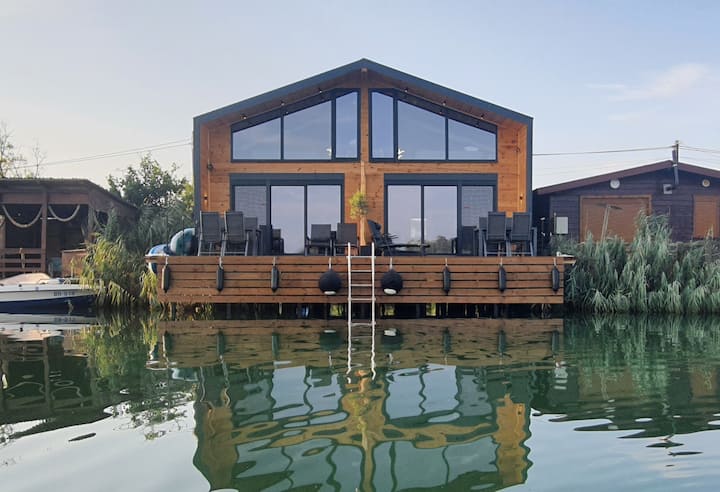 Modern river house with sea view II