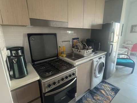 Popular Airbnb listing: Double bed, Prime location, Beach Access,Pool View in Al Mamzar