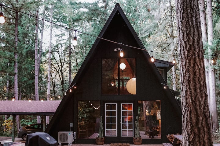 Bohemian Rustic 
A-Frame Cabin in the woods