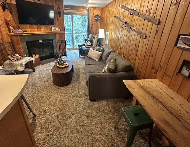 Cozy living room with wood-burning fireplace