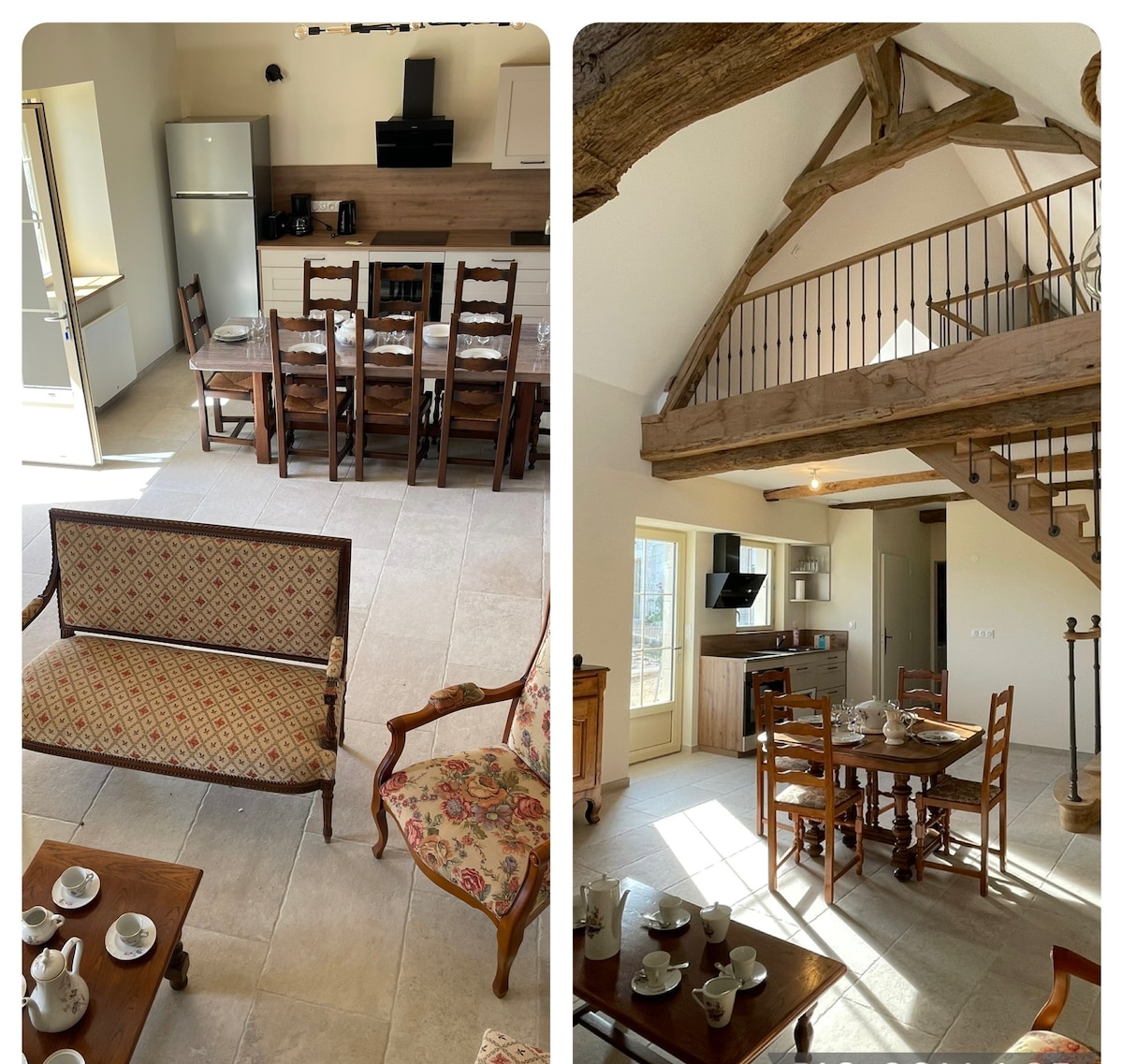 The open-plan living area features a dining table set for six, surrounded by wooden chairs. A cozy seating arrangement includes patterned armchairs and a vintage sofa. The kitchen is equipped with modern appliances. Exposed wooden beams highlight the high ceiling and lofted area above.