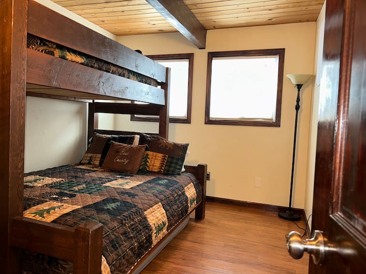 Bedroom # 3 or 3 Bedrooms has a BUNK BED with TWIN on Top & QUEEN on Bottom. There's also a TWIN mattress under the bunk that can be slid out onto the floor.