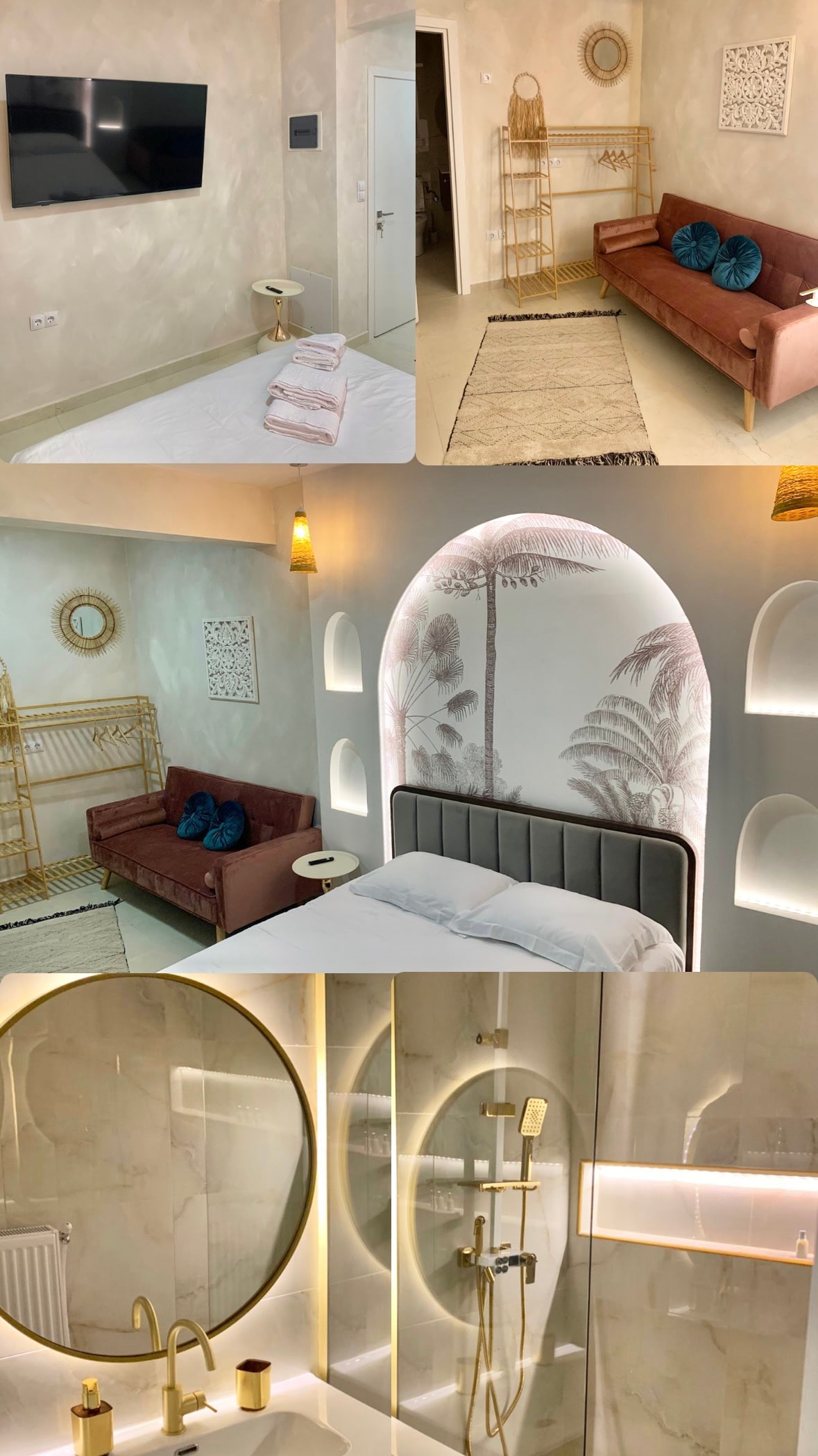 A cozy sleeping area features a spacious bed with neutral bedding, complemented by a seating area with a maroon sofa and decorative cushions. Unique wall art depicting palm leaves adds interest, while soft lighting is provided by a circular mirror and wall sconces.