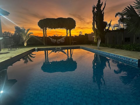 Swimming pool, Air conditioning, Gated community.