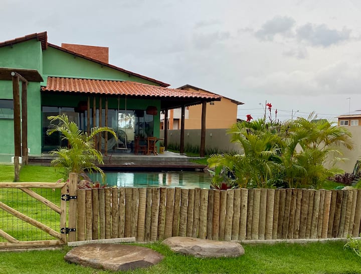 House in a condominium with a heated natural pool