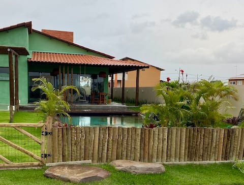 House in a condominium with a heated natural pool