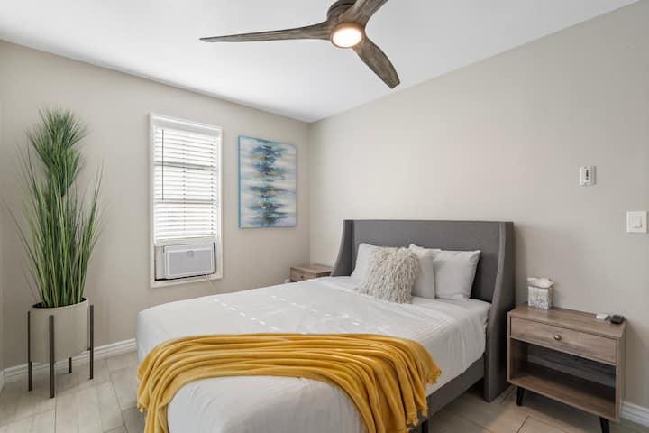 Bedroom 5 with queen bed located downstairs.