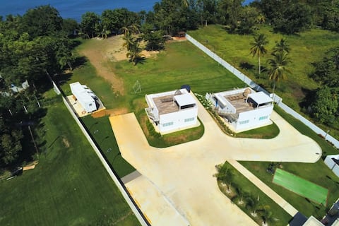 Two private beachfront houses, sleeps 12, kayaks