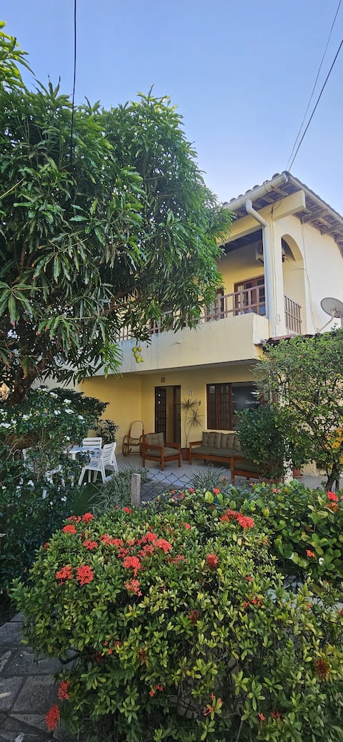 House in a Gated Community, Foot in the Sand