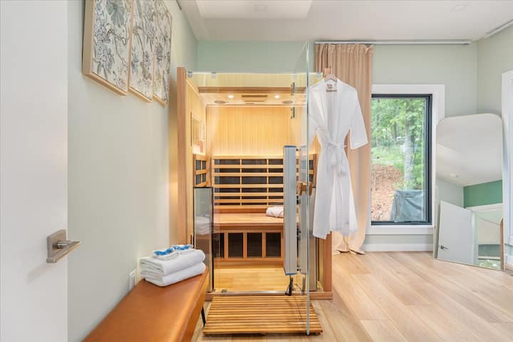 Shenandoah Nest Escape | Luxury Modern Cabin Near Bryce Resort, Lake Laura & Wineries Relax with a Clearlight Pro Sauna, massage decompression table, and red light therapy.