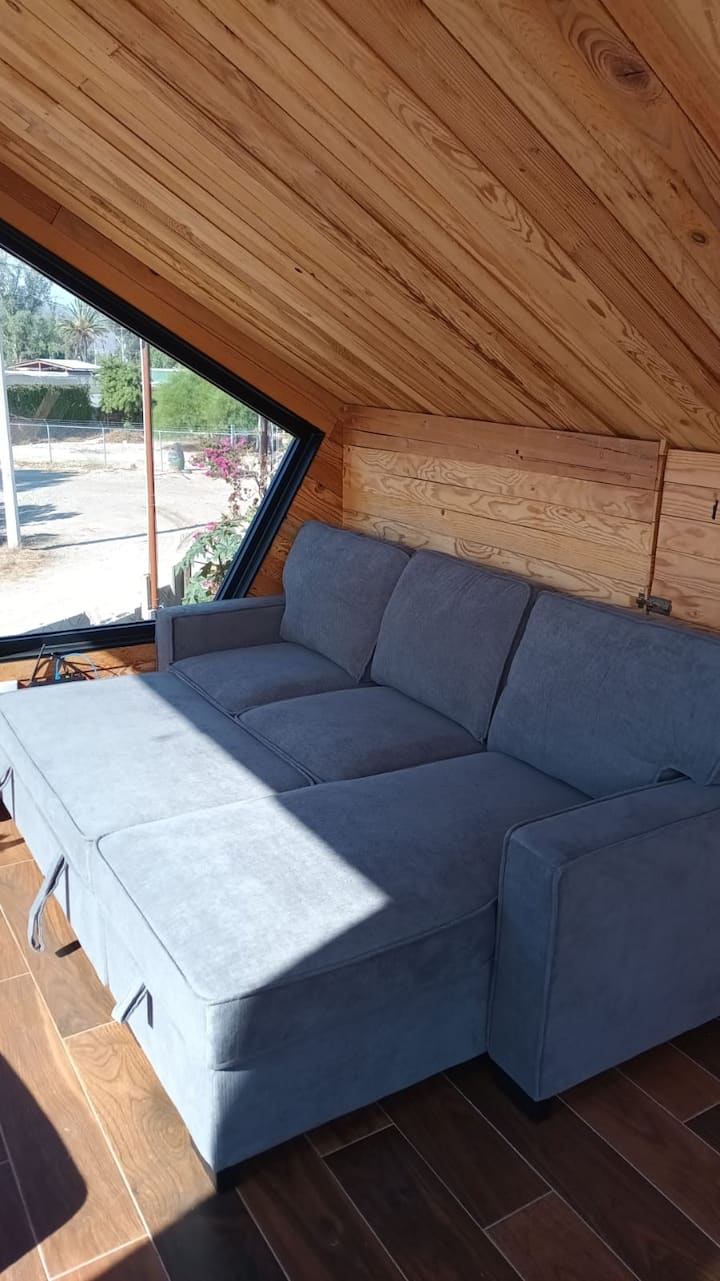 2nd floor cabin with a 180° view, no curtains or blinds.