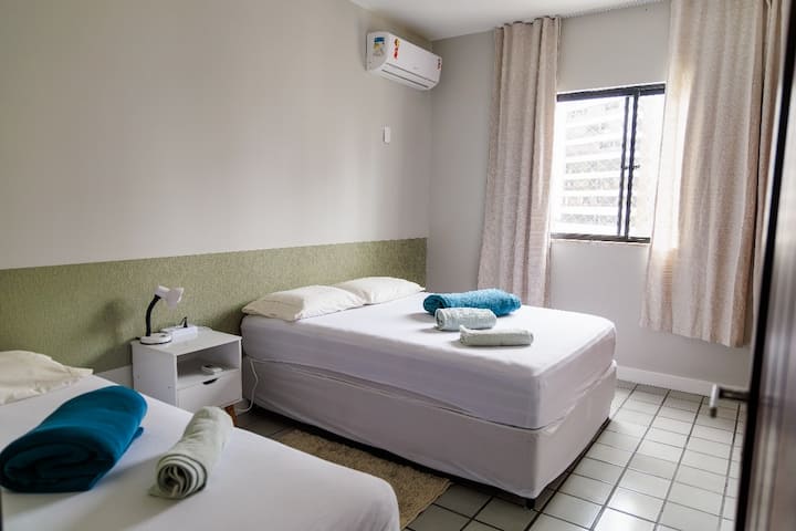 Room with air conditioning 
Single bed and a double bed 
