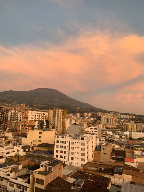 Room in a beautiful apartment, overlooking the volcano.