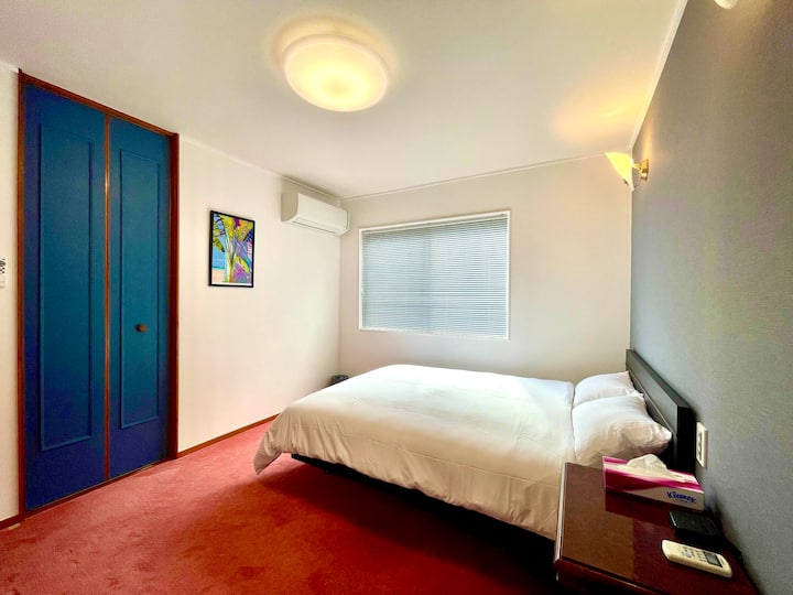 Each carpeted bedroom features its own private bathtub, toilet, and shower.