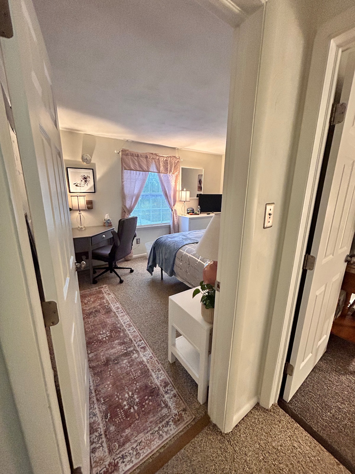 King bedroom with workspace