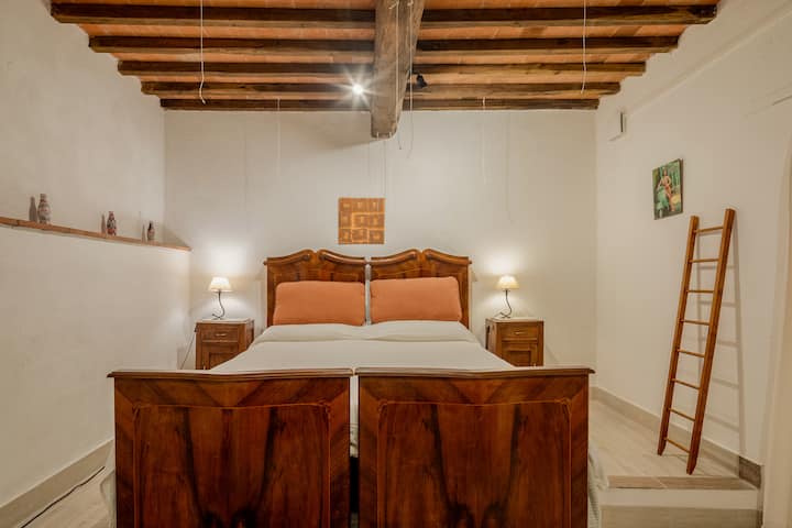 Twee eenpersoonsbedden (of samengevoegd tot 1 kingsize-bed).