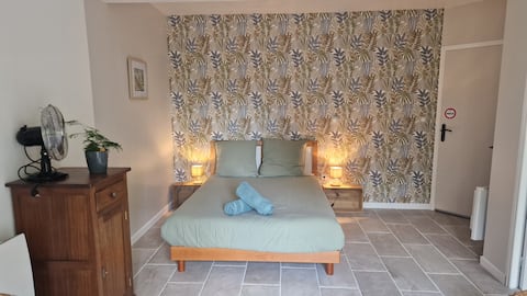 Ground floor bedroom with fridge and microwave