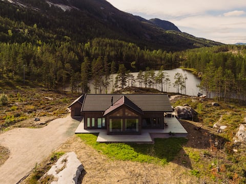 Villa Lakehouse Moss met sauna, boot & jacuzzi