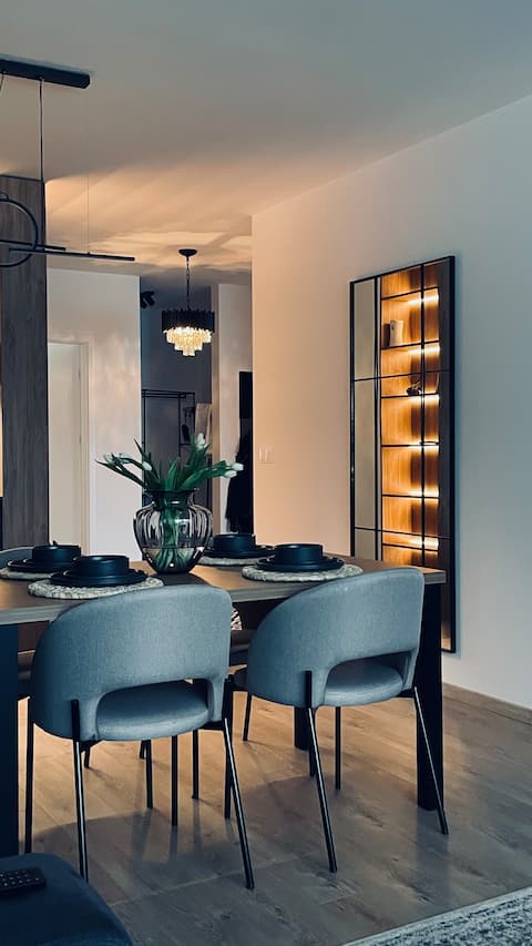 Exclusive apartment • Relax in the garden & parking