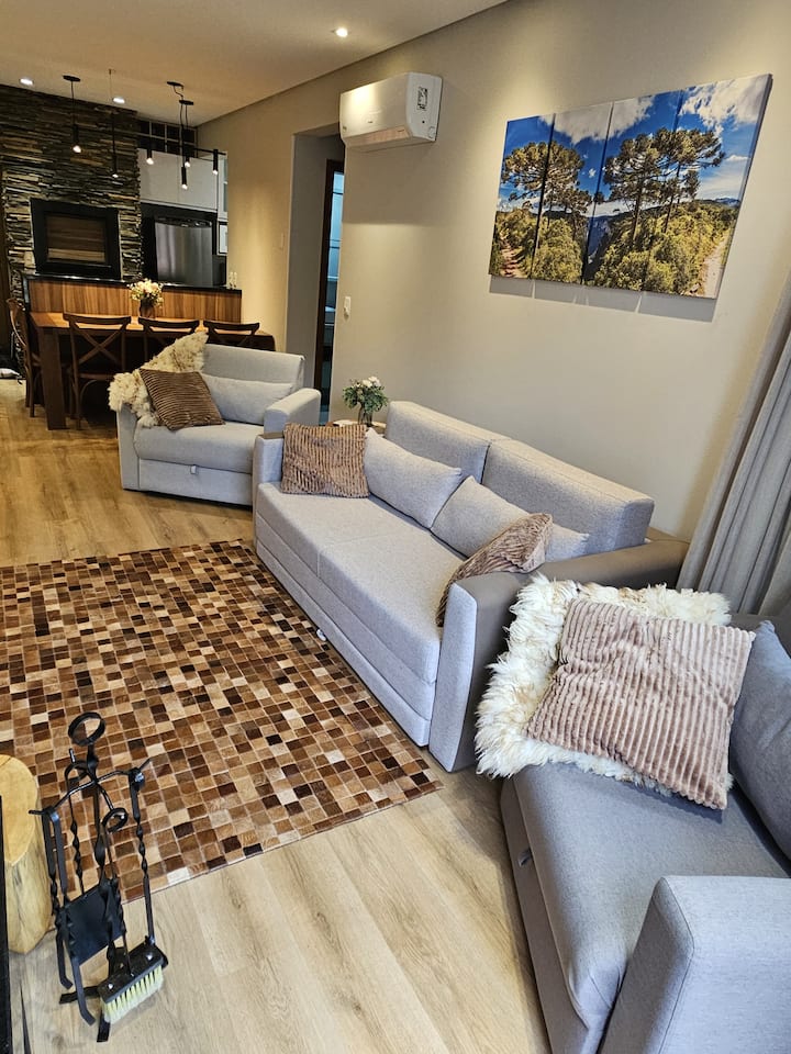 סלון Aconchegante עם ספה נפתחת ושתי כורסאות נוחות עם SmarTV 55אינץ ' ואח