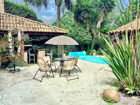 House with pool and fireplace