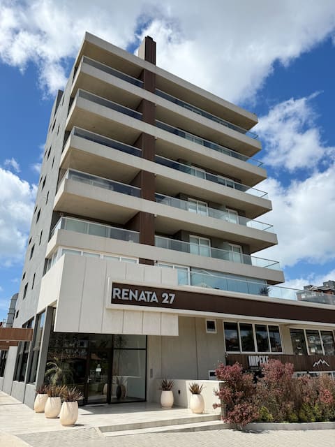 An apartment with ocean views, amenities, and a garage