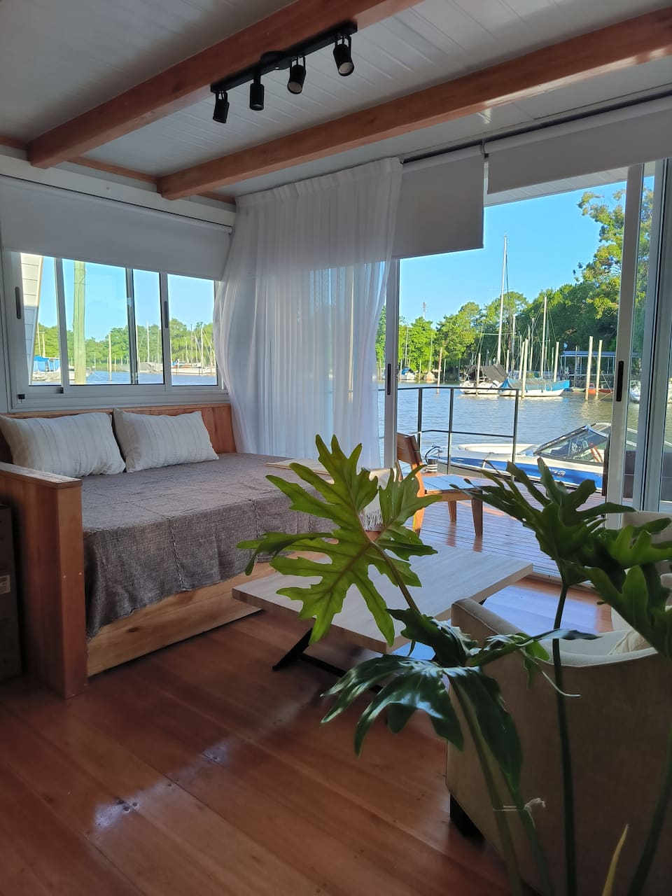 Sunny, a small houseboat in a quiet bay, San Fernando, Buenos Aires, Argentina, photo 1 of 10