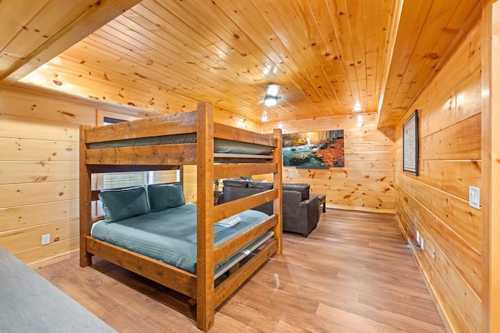 Queen over queen bunk on the lower level, with memory foam mattresses. Sleeps 4. NOT PICTURED: New Air Hockey Table and LED Suffleboard