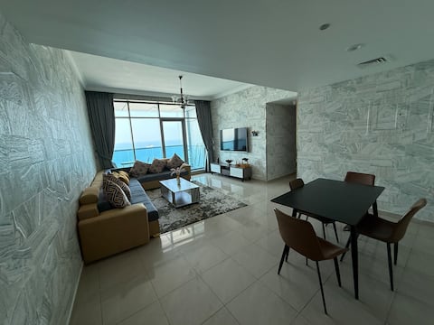 Beachfront Luxury 2BR | Sea View, Pool & Gym