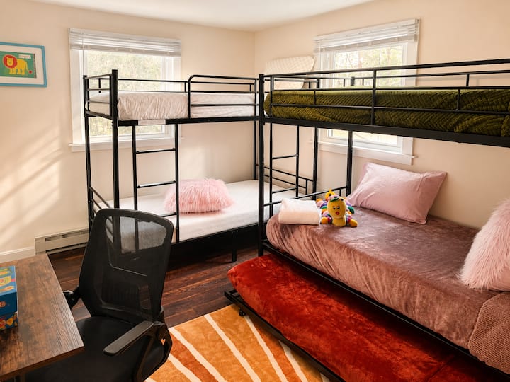 Climb into one of the bunk beds for a fun night's stay, sit down at the desk to draw, write or even play, or open the window for fresh air while the little ones settle in.