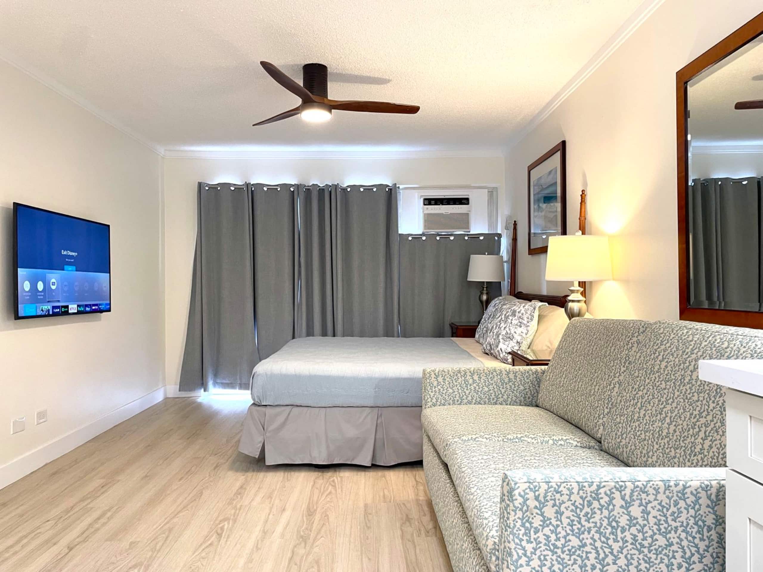 Steps to Waikiki Beach: 2BR with Free Parking - Image 1