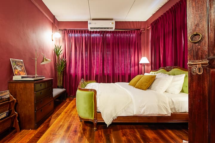 • Antique Elegance Suite
  - King bed, leather sofa, Smart TV, and round table
  - Real wooden floors with antique décor
  - Ensuite: Bathtub, separate rain shower, and toilet
  - Kitchen: Fridge, microwave, kettle, and toaster