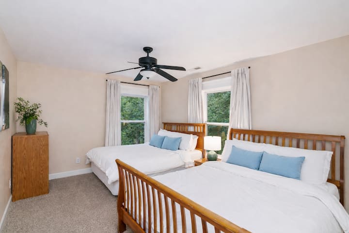 This room comfortably sleeps 4 people with it's own en-suite vanity & sink. The closet is HUGE in this bedroom with plenty of storage for at least 4 people.