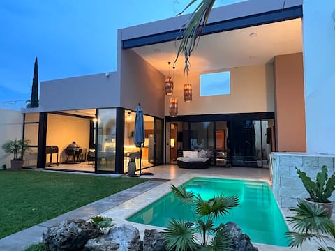 House with a Jacuzzi and heated pool