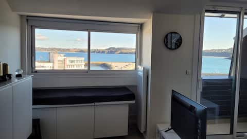 Popular Airbnb listing: Unobstructed sea view of the bay and harbor, balcony in Douarnenez