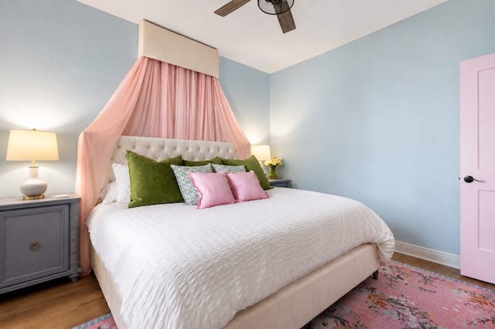 The Bridal Suite  Our dreamy king bedroom features a plush king bed, romantic canopy, and calming pastel décor—perfect for the bride, birthday girl, or anyone who deserves the best room in the house.