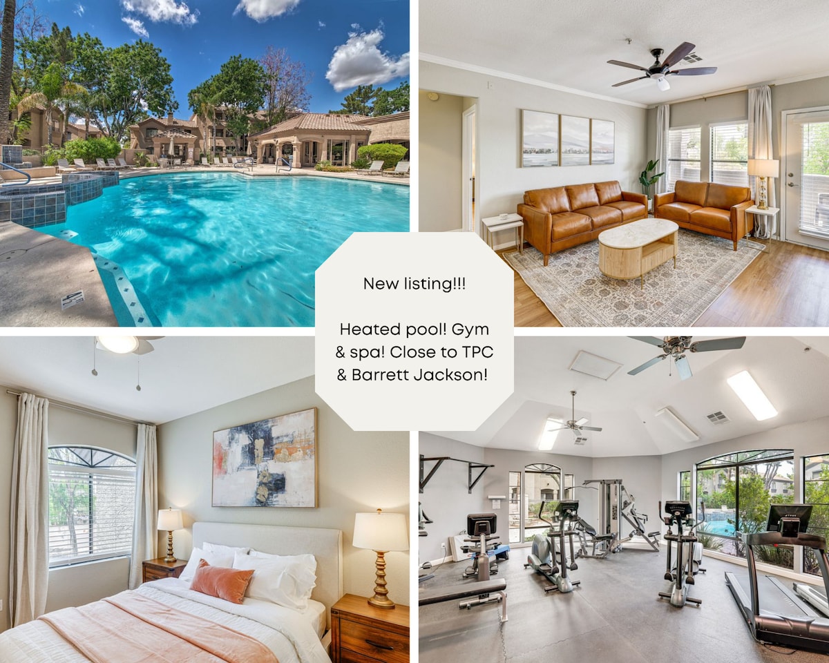 A spacious swimming pool is framed by well-maintained landscaping, offering a relaxing space with sun loungers nearby. The image captures a bright living area featuring light-colored furniture and a coffee table. A well-equipped gym area is visible, showcasing various workout equipment and overhead fans.