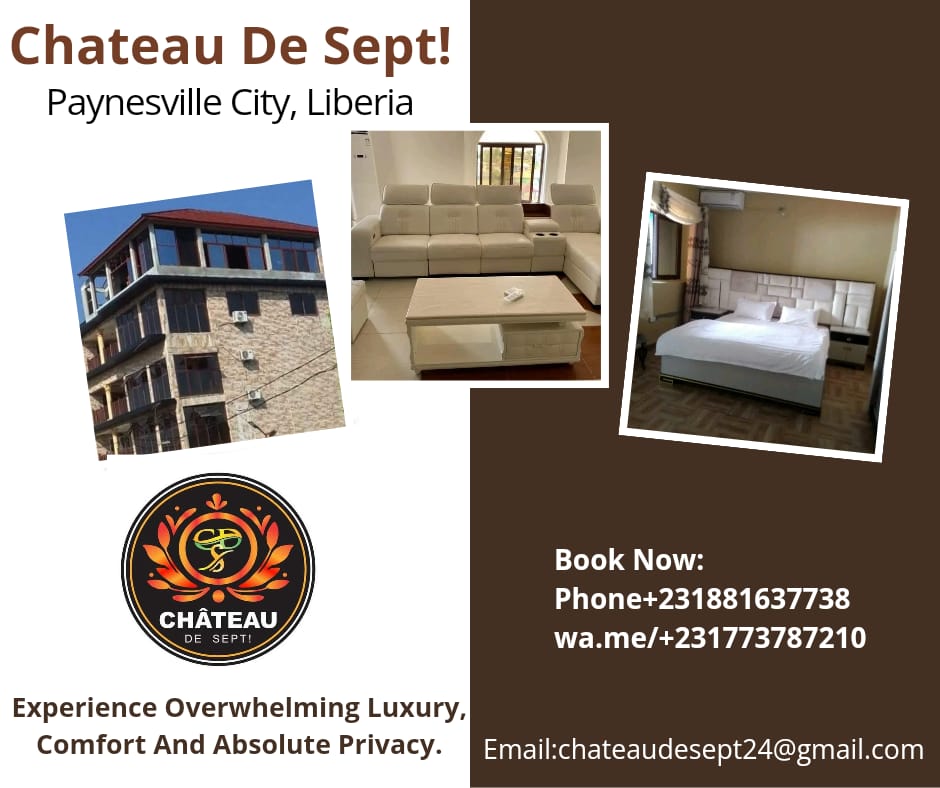 A stylish living area features a modern sectional sofa and minimalist coffee table. A spacious bed is present with neutral linens, and the walls display a light wood finish. Soft lighting creates a relaxing atmosphere, while subtle decorative accents are positioned throughout the space.