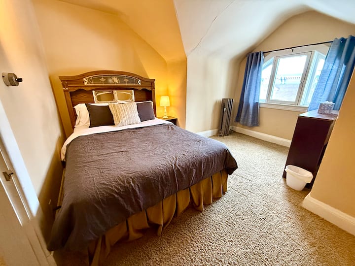 Queen size bed with closet.