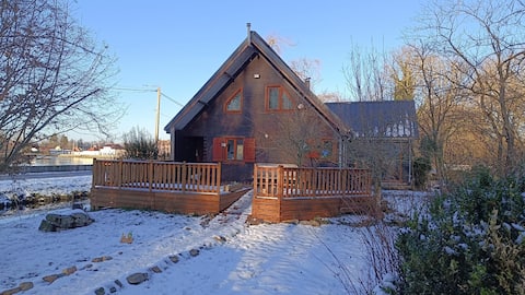 Wooden cottage in nature reserve
