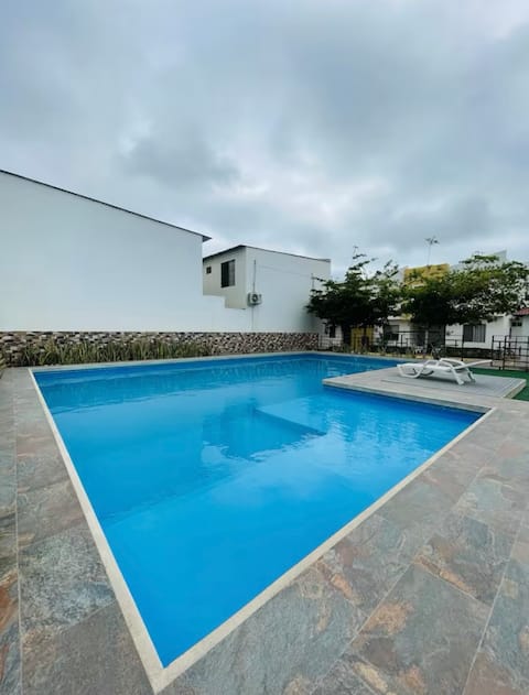 4-bedroom house in private development with A/C and pool